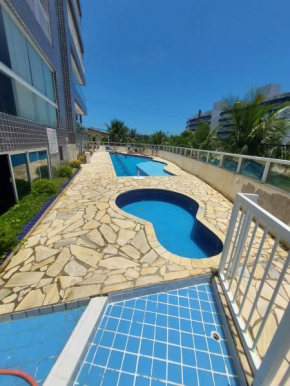 Apartamento a 50m praia maitinga, wifi, churrasqueira na varanda